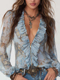 Marta | Blusa de gasa azul estampada con volantes