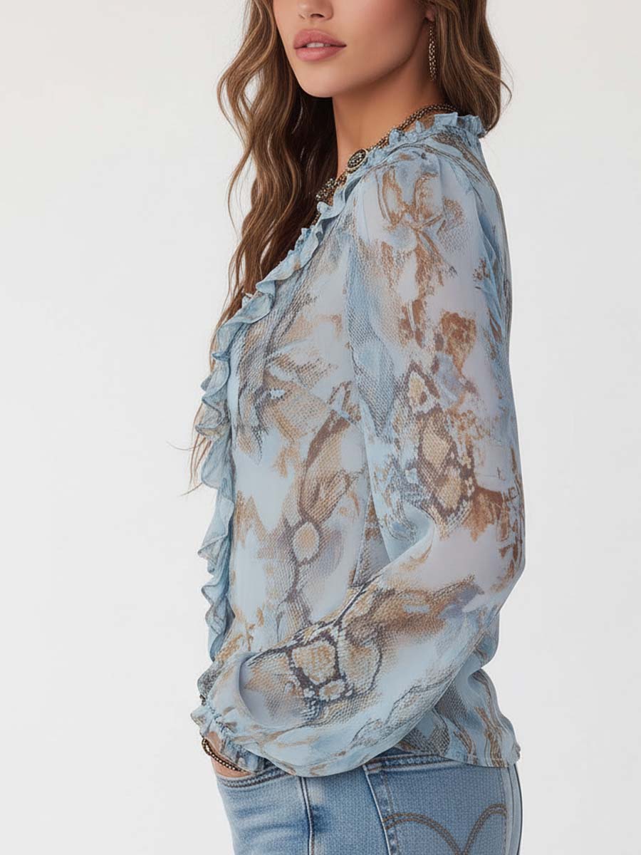 Marta | Blusa de gasa azul estampada con volantes