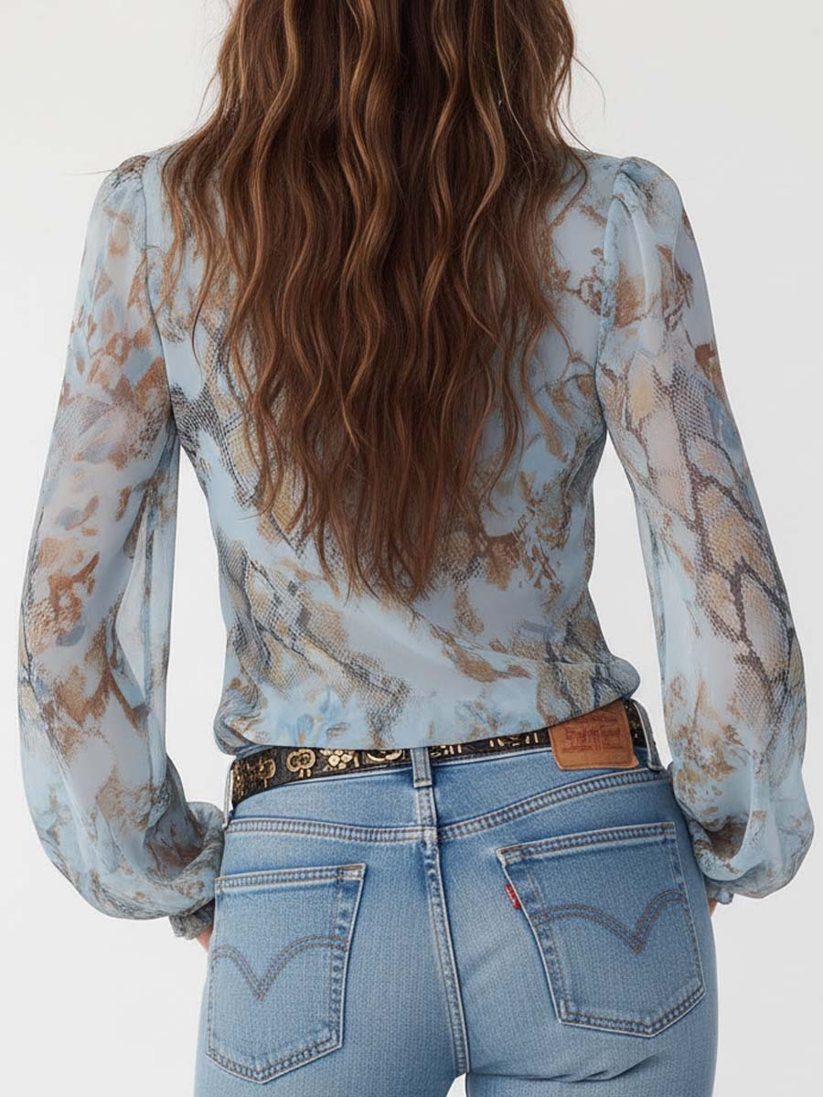 Marta | Blusa de gasa azul estampada con volantes