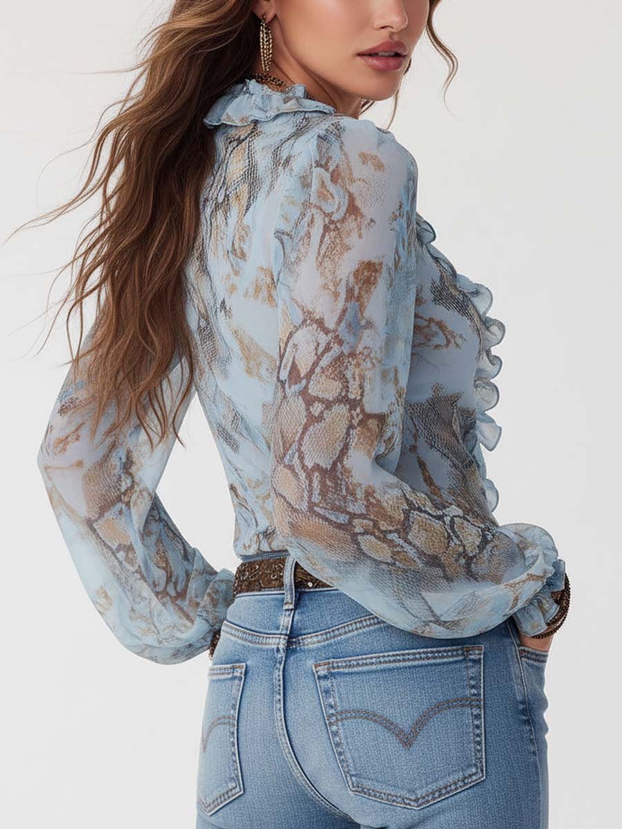 Marta | Blusa de gasa azul estampada con volantes