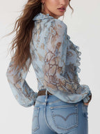Marta | Blusa de gasa azul estampada con volantes