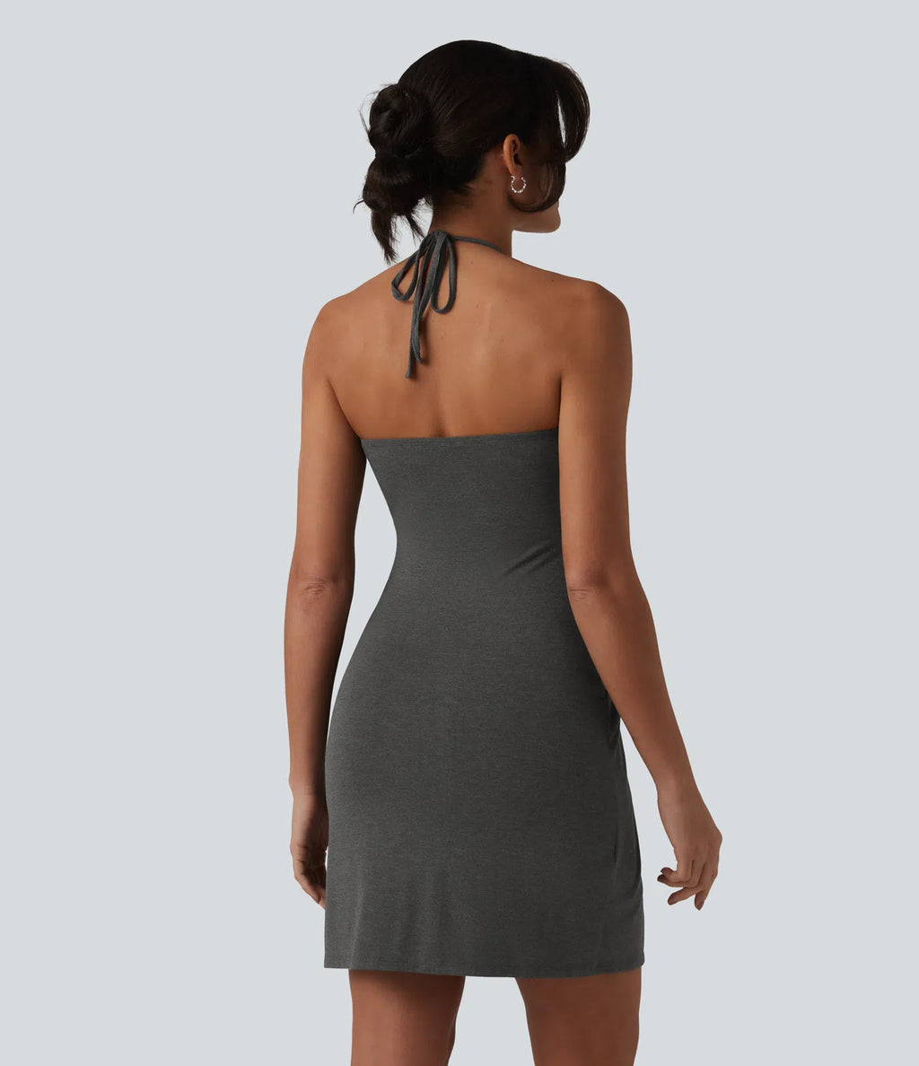 Garazi | Vestido mini de estilo resort con tirantes cruzados a la espalda y bolsillos