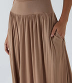 Rosario | Vestido maxi asimétrico de canalé con bolsillos