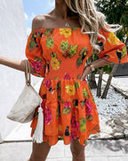 Mercè | Vestido de mujer elástico con hombros descubiertos, estampado floral de frutas tropicales, cintura fruncida y bajo con volantes, corte en A.