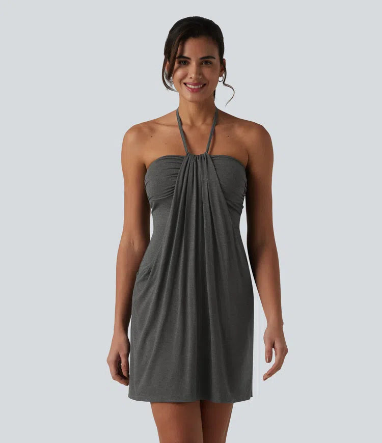 Garazi | Vestido mini de estilo resort con tirantes cruzados a la espalda y bolsillos