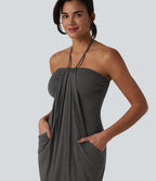 Garazi | Vestido mini de estilo resort con tirantes cruzados a la espalda y bolsillos