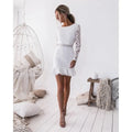 Vestido corto blanco con encaje y espalda abierta