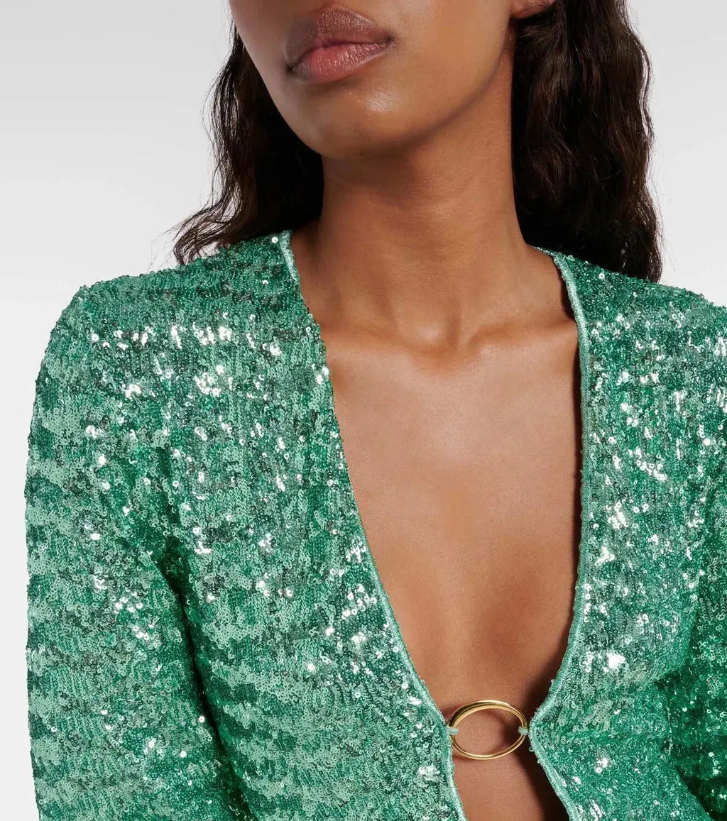 Vestido corto con brillo y escote en V