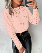 Blusa de cuello redondo con detalle de botones