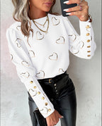 Blusa de cuello redondo con detalle de botones