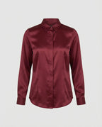 Blusa entallada de acabado satinado