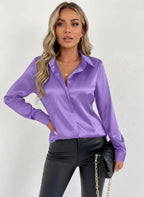 Blusa entallada de acabado satinado