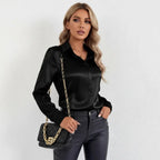 Blusa entallada de acabado satinado