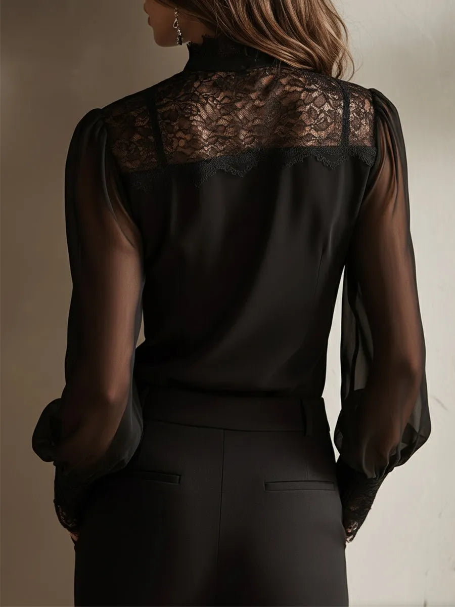 Blusa negra con lazada al cuello