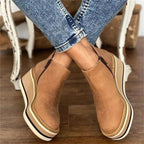 Botines de cuña y plataforma con cremallera lateral