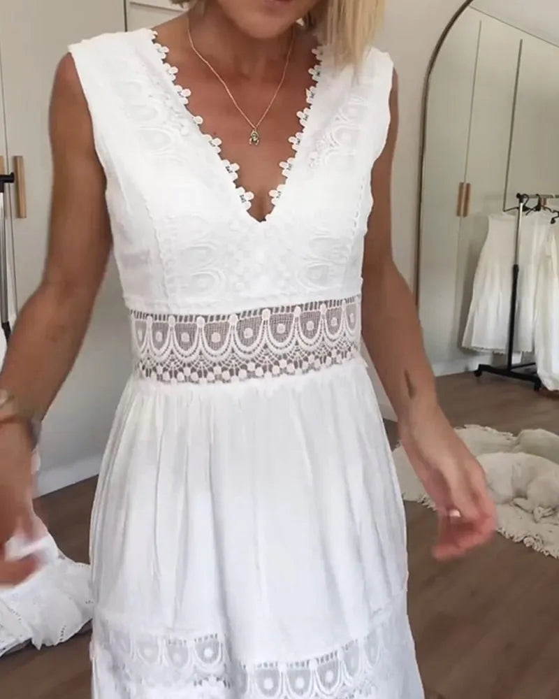 Vestido midi blanco con detalles de encaje