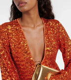 Vestido corto con brillo y escote en V